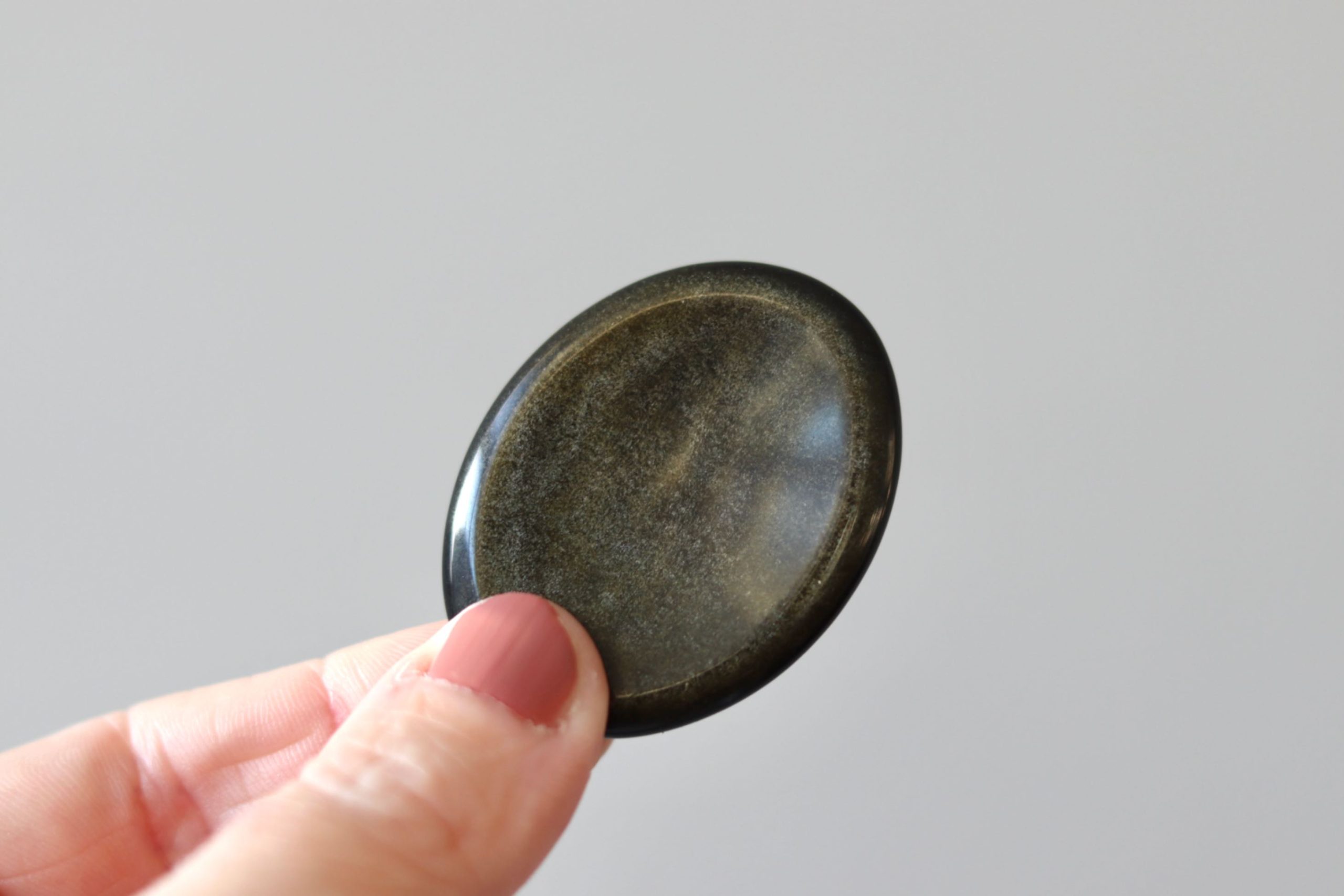 Beschermende-worry-stone-goud-obsidiaan Beschermende worry stone goud obsidiaan